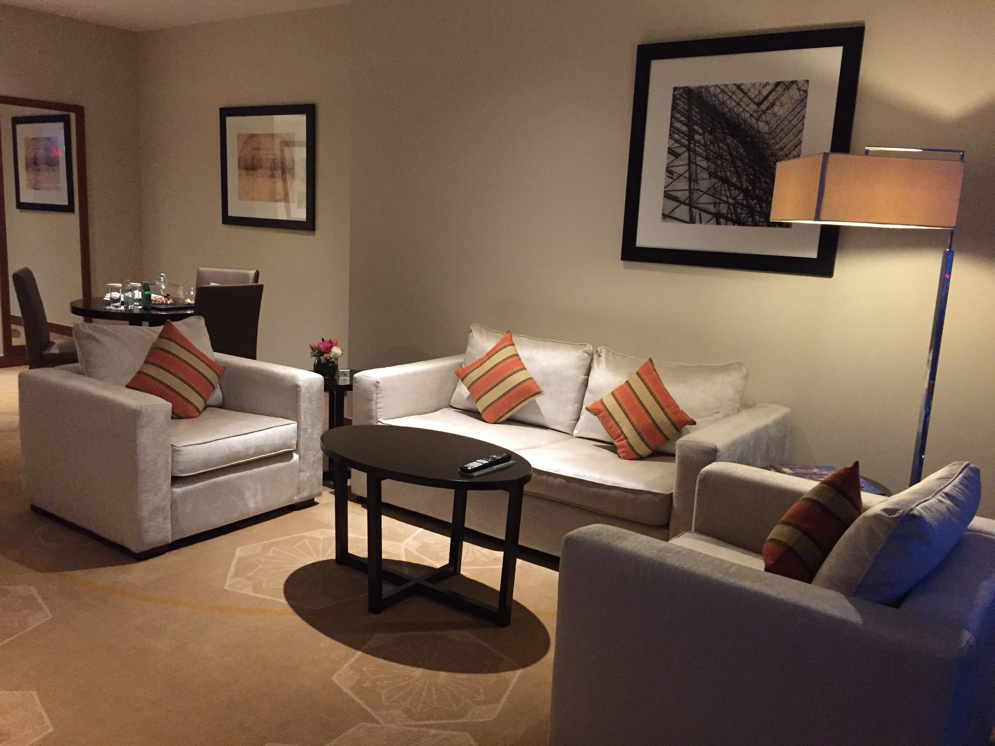 Huge living room can features 3 sofas and can fit 5 adults- InterContinental Doha The City