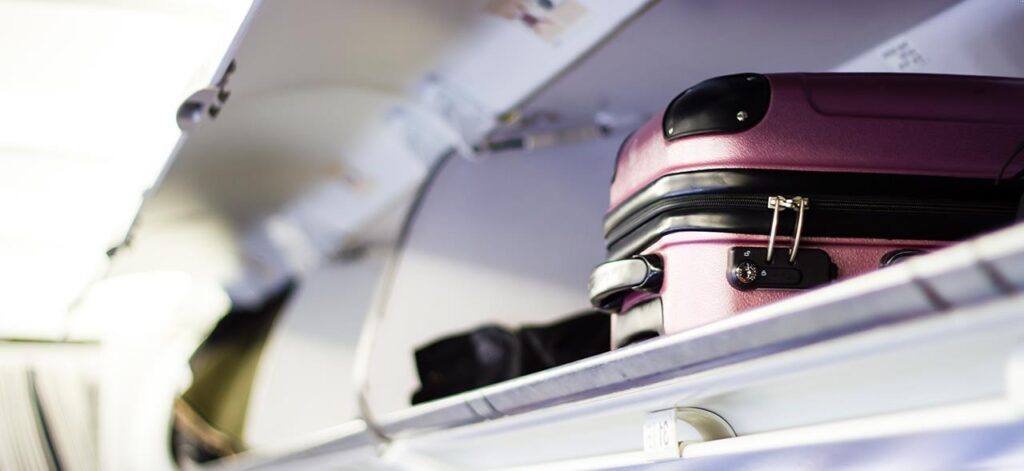 Carry-on luggage in overhead bin